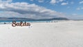 Tourists walking in the beach of Salda Lake, Burdur, Turkey