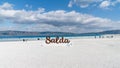 Tourists walking in the beach of Salda Lake, Burdur, Turkey