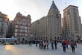 Tourists walking in the Bund, the most scenic spot in Shanghai. On background the most famous Chinese skyscrapers Royalty Free Stock Photo