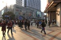 Tourists walking in the Bund, the most scenic spot in Shanghai. On background the most famous Chinese skyscrapers Royalty Free Stock Photo