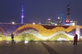 Tourists walking in the Bund, the most scenic spot in Shanghai. On background the most famous Chinese skyscrapers Royalty Free Stock Photo