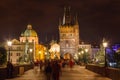 Charles Bridge (Karluv most), the old town tower bridge and St Francis of Assisi church at night Prague, Czech republic Royalty Free Stock Photo