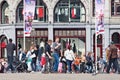 Tourists walking on a crowdy Dam Square, Amsterdam, Netherlands