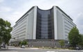 Tourists walking in front of Osaka Prefectural Police Headquarters, July 15, 2017