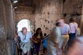 Tourists walking inside colosseum stairs at Rome