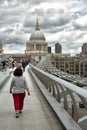 Tourists walking on milenium bridge in London Royalty Free Stock Photo