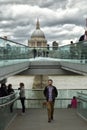Tourists walking on milenium bridge in London Royalty Free Stock Photo