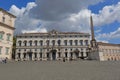 Tourists walking near the obelisk in Piazza del Quirinale