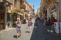 Tourists walking near to the Clock Tower in Taormina, Sicily. TAORMINA, ITALY - JULY, 2, 2015