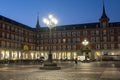 Tourists walking at the night Plaza Mayor, the central square in Madrid, Spain Royalty Free Stock Photo