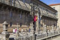 Tourists walking in the Obradoiro Square in front of the Hostal de Los Reyes CatÃ³licos. Santiago de Compostela, Galicia, Spain. Royalty Free Stock Photo