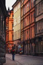 Tourists walking on the old cobble streets in the market in Gamla Stan, the old town of Stockholm in Sweden