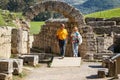 Tourists walking over the ruins