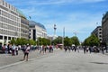 Tourists walking in Pariser Platz and TV tower on the background, Berlin, Germany
