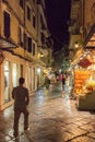 Tourists walking and shopping on narrow streets Royalty Free Stock Photo