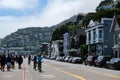 Tourists walking and bicycling filling the streets of Sausalito California