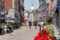 Tourists walking on St Paul Street and visiting Old Montreal in Summer Royalty Free Stock Photo