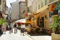 Tourists walking in a street in Avignon, a city in southeastern France Provence region, set on the Rhone River Royalty Free Stock Photo