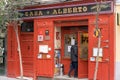 Tourists walking through the streets of the beautiful and pretty district in Madrid in a sunny day of Spring Shortly before a viru