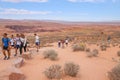 Tourists walking to the iconic Horseshoe Bent on the Colorado River