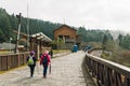 Tourists walking to the misty forest in Alishan National Forest Recreation Area in winter in Chiayi County, Alishan Township.