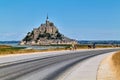 Tourists walking to Mont Saint Michel Normandy France