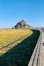 Tourists walking to Mont Saint Michel Normandy France