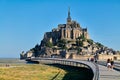 Tourists walking to Mont Saint Michel Normandy France