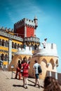 Tourists walking towards the main entrance of Pena National Palace in Sintra, Lisbon, Portugal Royalty Free Stock Photo
