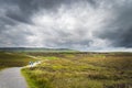 Tourists walking on the trail towards Cuilcagh Mountain Park Royalty Free Stock Photo