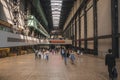 Tourists walking in Turbine Hall of Tate Modern Museum at London Royalty Free Stock Photo