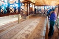 Tourists walking and watching ancient floor mosaic. Kourion was an ancient city on the southwestern coast of Cyprus
