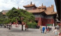 Tourists walking about Yonghegong Lama Temple