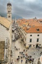 Tourists Wander the Stradunon a Rainy Day, Dubrovnik Royalty Free Stock Photo