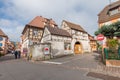 Tourists wander the streets of charming village of Eguisheim,France. Royalty Free Stock Photo