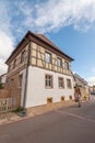 Tourists wander the streets of charming village of Eguisheim,France. Royalty Free Stock Photo