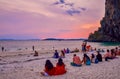 Tourists watch sunset on Railay beach, Ao Nang, Thailand Royalty Free Stock Photo