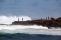 Tourists watching dangerous winter ocean waves