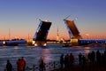 Tourists watching the divorce of the Palace bridge in St. Petersburg Royalty Free Stock Photo