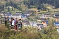 Tourists watching the Gaoyao Rice terraces in Guizhou from a viewpoint