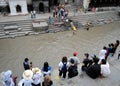 Tourists Watching Hindu Cremation Process & Rituals