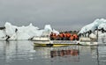 Tourist at Jokulsarlon glacier lagoon in south Iceland