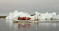 Tourist at Jokulsarlon glacier lagoon in south Iceland