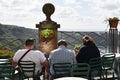 Tourists are watching the lake from terrace in Nemi. A nice little town in the metropolitan city of Rome. Nemi, Lazio, Italy