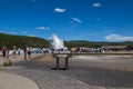 Tourists Watching Old Faithful Erupt