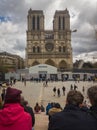 Tourists watching the renovation of Notre-Dame in Paris, France Royalty Free Stock Photo