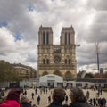 Tourists watching the renovation of Notre-Dame in Paris, France Royalty Free Stock Photo