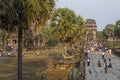 Tourists watching sunrise, Angkor Wat temple Royalty Free Stock Photo