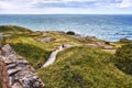 Tourists on the way to visit Hammershus castle - Scandinavia`s largest medieval fortification Royalty Free Stock Photo