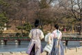 Tourists wearing traditional Korean clothes Hanbok at the Gyeongbokgung Gyeongbokgung Palace or Gyeongbok Palace, the main royal Royalty Free Stock Photo